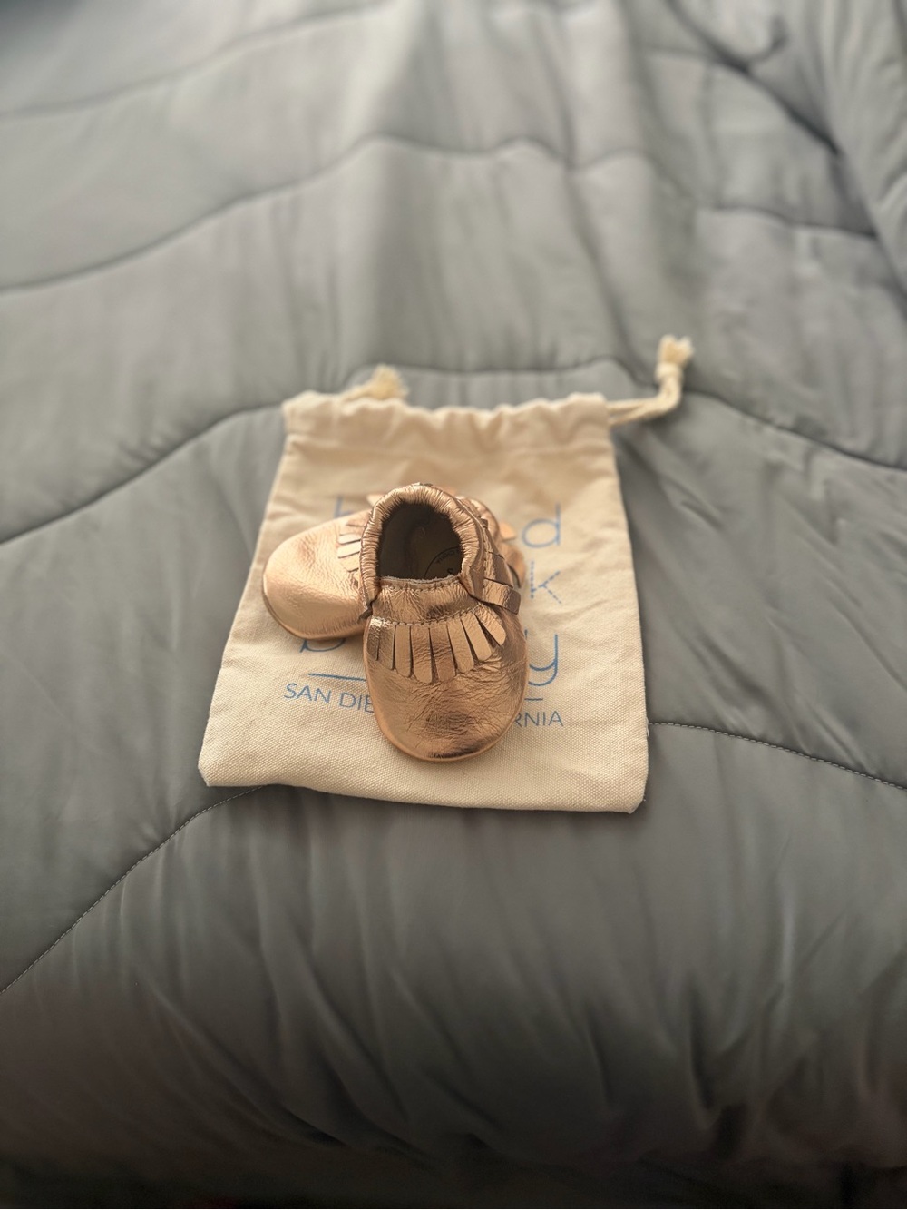 Metallic Rose Gold Baby Moccasins with Fringe